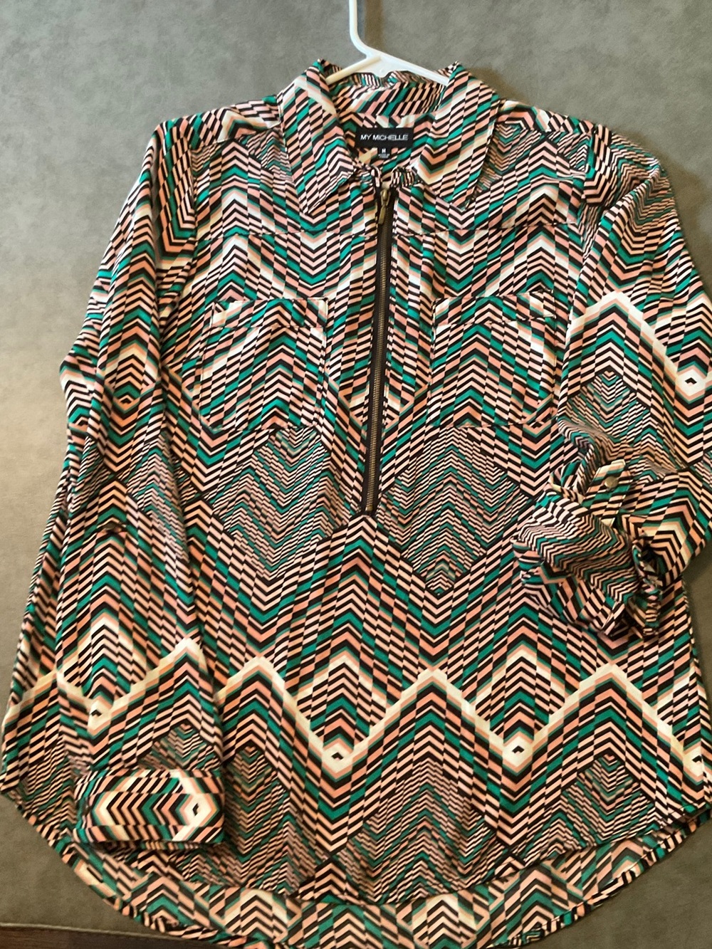 My Michelle Teal Black and Cream Geometric Zip Blouse
